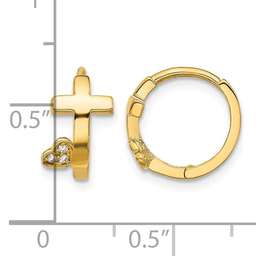 Gold cross and heart charm on a gold hinged hoop earring, shown next to a ruler indicating approximately half-inch scale.