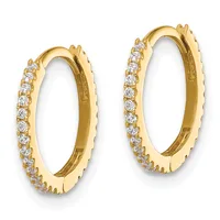 A pair of yellow gold hoop earrings with diamond accents along the outer edge, shown against a white background.