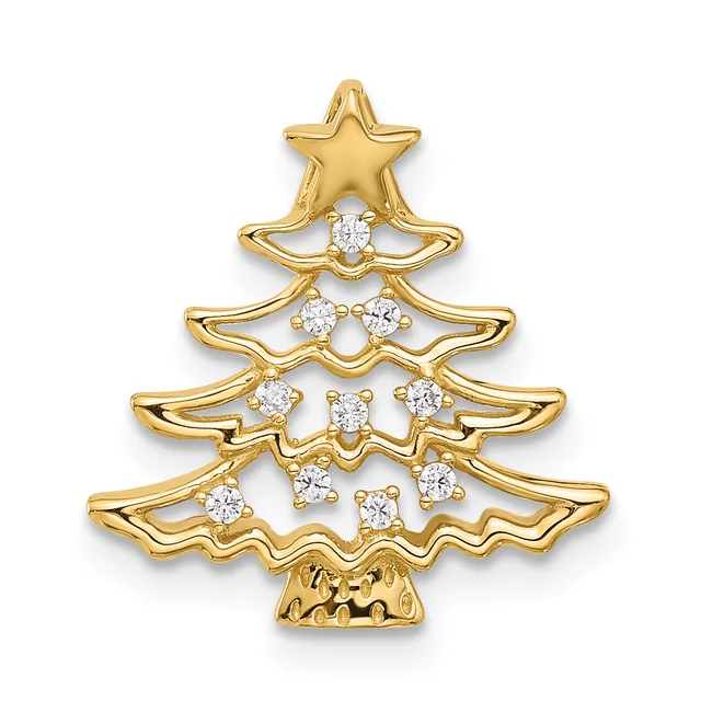 A gold-toned Christmas tree brooch with a star on top and cubic zirconia stones arranged in a decorative pattern on four tiered branches.