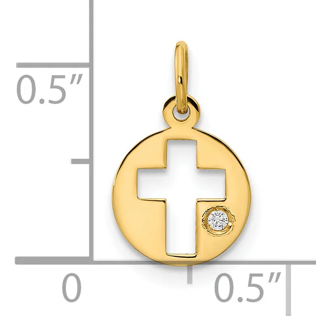 Gold circular pendant with cutout cross design and small diamond accent, shown next to ruler indicating approximately 0.5 inch dimensions.