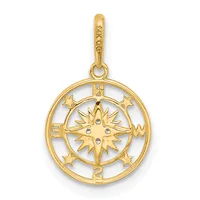 Gold compass rose pendant with eight-pointed star center surrounded by four smaller stars, suspended from a bail loop.