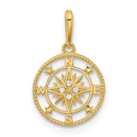 Gold compass rose pendant with cardinal directions marked N, S, E, W, surrounded by a circular rope-textured border and small stars, featuring white stone accents in the center.