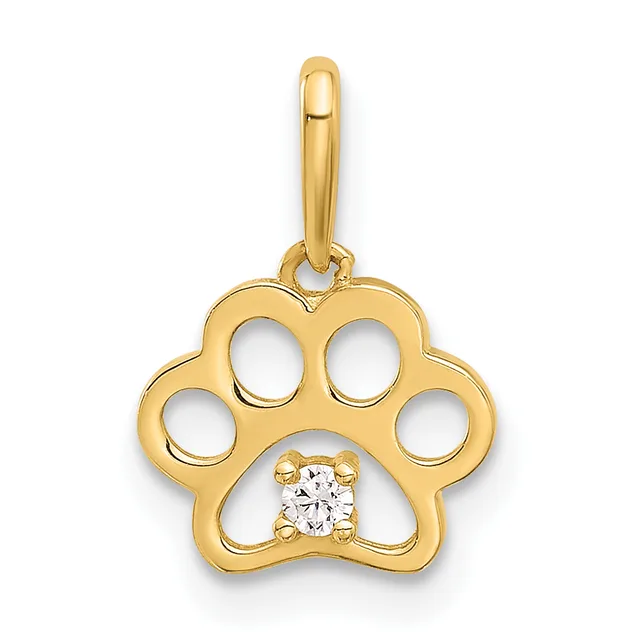Gold paw print pendant with four oval cutouts around the edges and a round diamond or cubic zirconia stone set in the center pad, suspended from a gold bail.