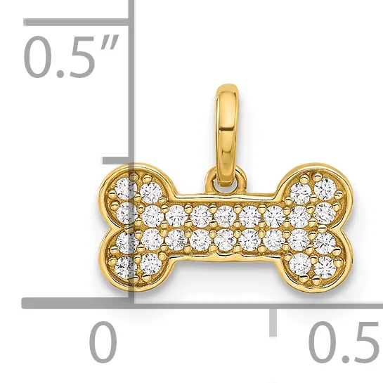 Gold bone-shaped pendant with round cubic zirconia stones set throughout, shown with a measurement scale indicating approximately half an inch in width.