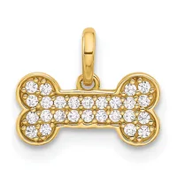 A gold bone-shaped pendant with cubic zirconia stones set throughout, suspended from a gold bail.