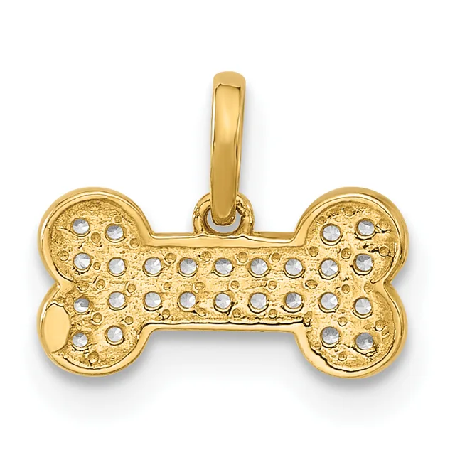 Gold dog bone pendant with a textured surface decorated with small round white stones arranged in rows, suspended from a bail loop.