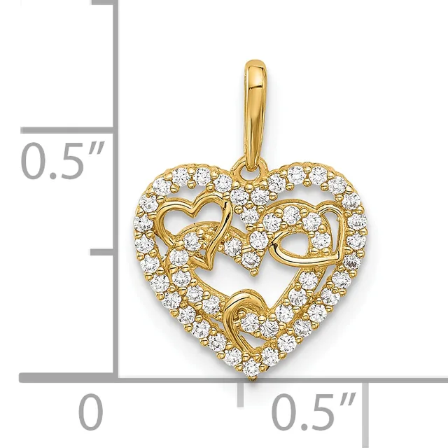 Gold heart pendant with two intertwined hearts outlined in cubic zirconia stones, suspended from a bail, shown against a measurement scale.