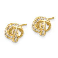 A pair of gold stud earrings with interlocking knot designs accented with cubic zirconia stones, shown from the front.