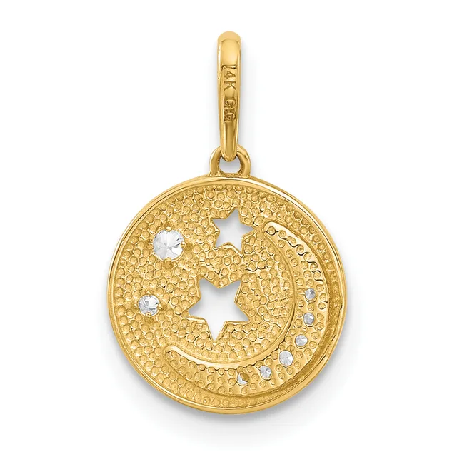 Gold circular pendant with textured surface featuring cutout stars and moon, set with small clear crystals, suspended from a gold bail.