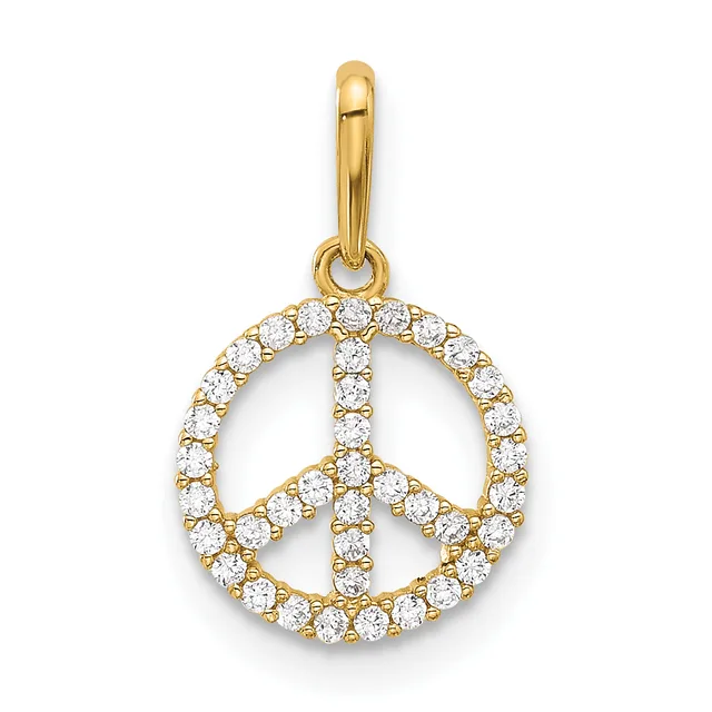 A gold peace symbol pendant with a polished bail, outlined and filled with round cubic zirconia stones, shown against a white background.