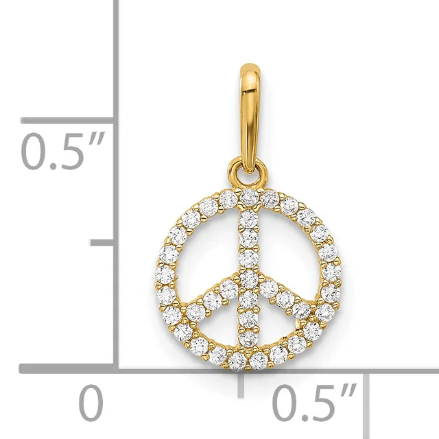 Gold peace sign pendant with cubic zirconia stones set around the outline, shown next to a measurement scale indicating approximately 0.5 inches in width and height.