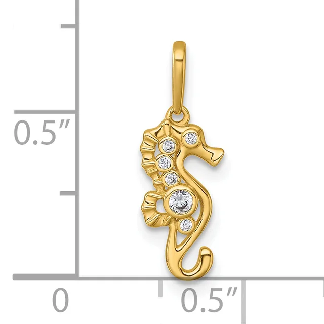Gold seahorse pendant with cubic zirconia stones arranged along its body, shown next to a measurement scale indicating approximately half an inch in height.