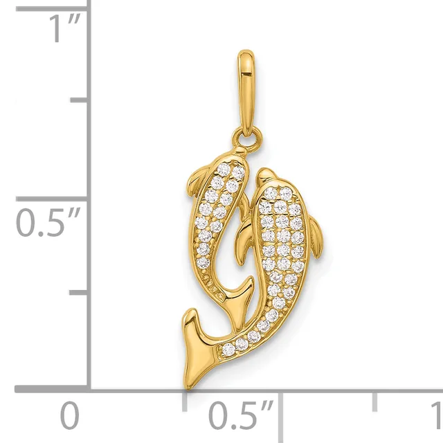 Gold dolphin pendant with cubic zirconia stones covering the body, shown next to a ruler indicating it is approximately one inch tall.