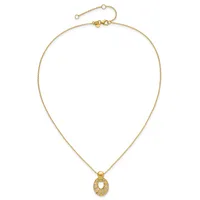 Gold-toned chain necklace with an adjustable clasp and a textured oval pendant hanging from the center.