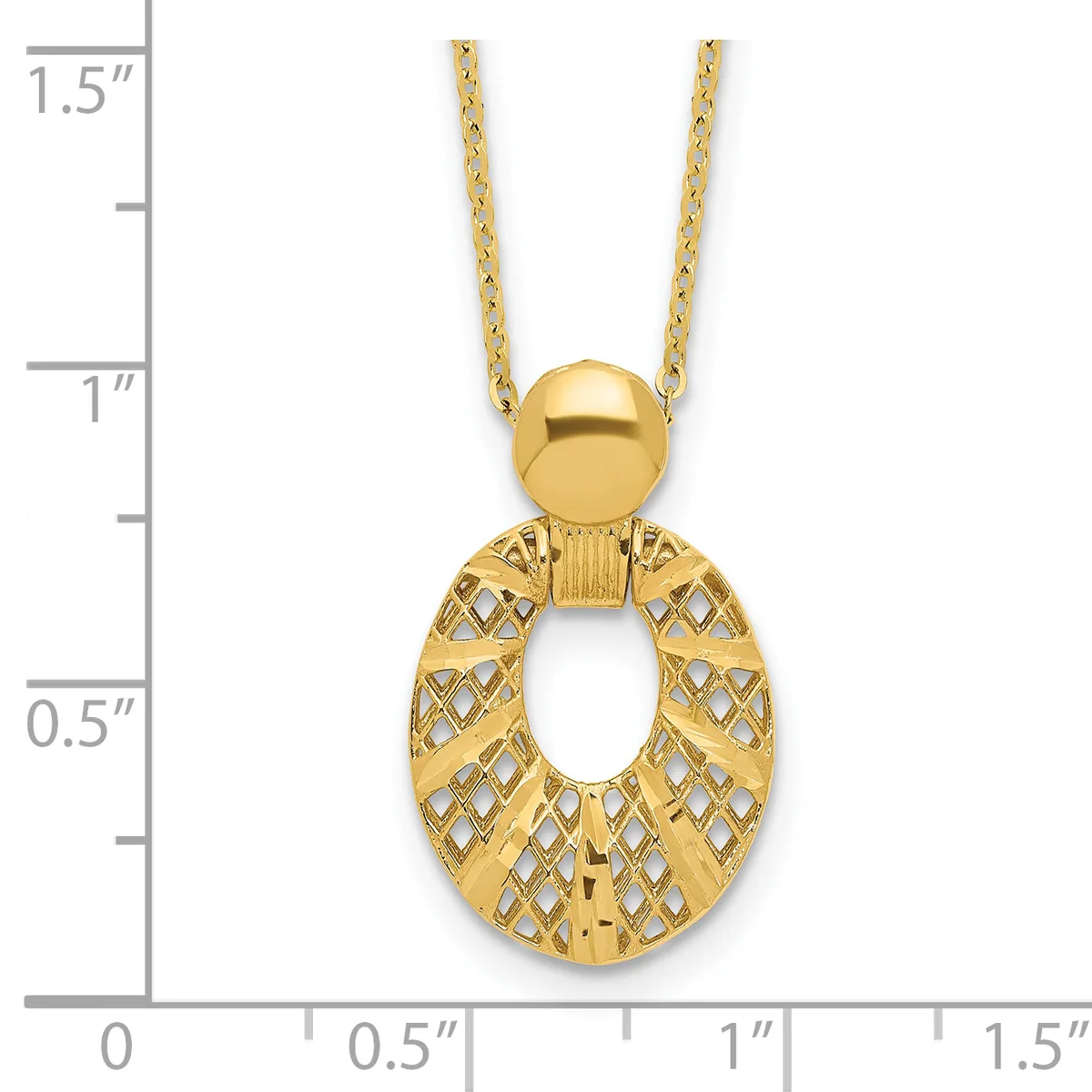 Gold pendant necklace with a polished sphere at top and an open oval charm below with textured lattice pattern, shown against a measurement scale.