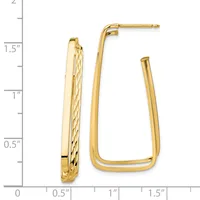 Two gold hoop earrings displayed against a measurement scale, one with a textured surface and one smooth, both approximately 1.5 inches tall.