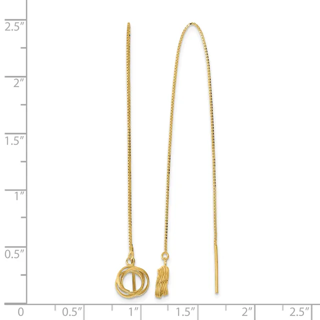 Three gold threader earrings displayed against a ruler showing heights up to 2.5 inches: one with a circular knot pendant, one with a tassel, and one plain bar design.