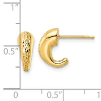 A pair of gold hoop earrings with a textured finish on one side and polished curved surface on the other, shown next to a measurement ruler indicating approximately half-inch width.