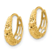 Pair of gold hoop earrings with a textured diamond-cut pattern on the outer surface and hollow interior detail, shown against a white background.
