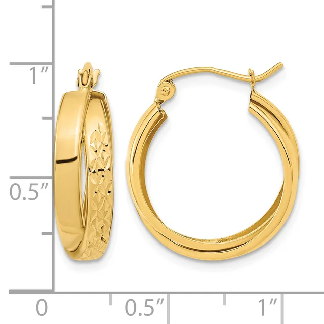 Pair of gold hoop earrings with polished and textured surfaces, shown next to a measurement scale indicating approximately one inch in diameter.