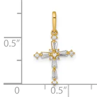 A gold cross pendant with round and baguette-cut cubic zirconia stones arranged in a cluster pattern, shown against a ruler measuring approximately 0.5 inches wide.