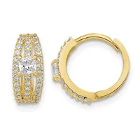 A pair of gold hoop earrings with square-cut diamond centers surrounded by smaller diamonds set in multiple rows along the band.
