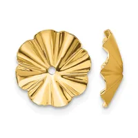 Gold-colored flower-shaped bead cap shown from front and side views, displaying radiating petal details and a center hole.