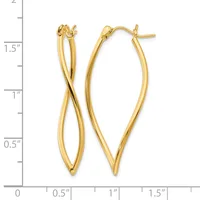 Gold-colored twisted oval hoop earrings with post and clutch backs, displayed against a measurement scale showing approximately 1.5 inches in length.