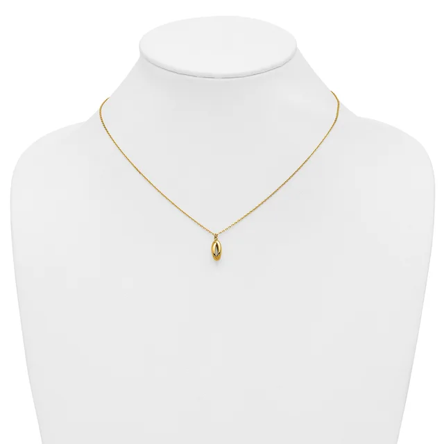 A gold-toned delicate chain necklace with a small polished oval pendant, displayed on a white mannequin bust.