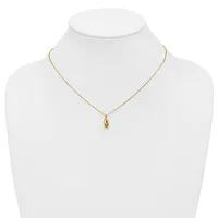 A gold-toned delicate chain necklace with a small polished oval pendant, displayed on a white mannequin bust.