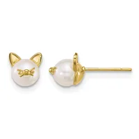 Pair of gold stud earrings featuring white pearl spheres with small gold cat ear details and bow motifs, shown from front and side views.