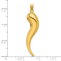 A polished gold pendant shaped like an elongated curved horn or chili pepper, displayed against a measurement scale showing it is approximately 1.25 inches long.