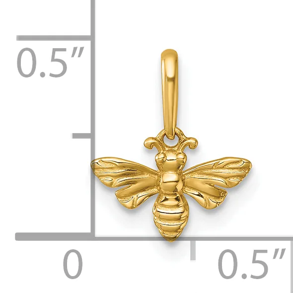 A gold bee pendant with outstretched wings and a hinged bail, shown against a scale ruler measuring approximately 0.5 inches in height and width.