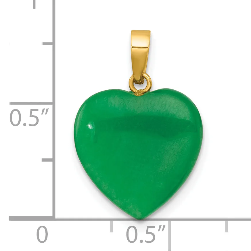 A green jade heart pendant with a gold-tone bail, shown next to a ruler indicating its size is approximately half an inch wide.