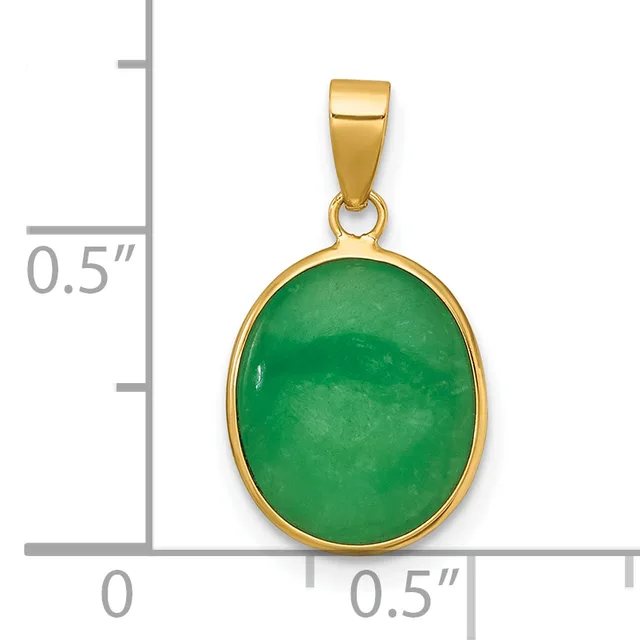 A gold-toned pendant with an oval green jade stone set in a bezel, displayed against a measurement scale showing approximately 0.5 inches in height.