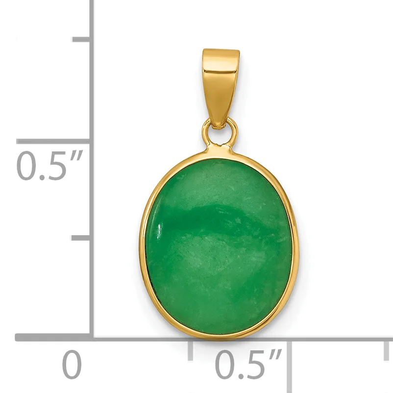 A gold-toned pendant with an oval green jade stone set in a bezel, displayed against a measurement scale showing approximately 0.5 inches in height.