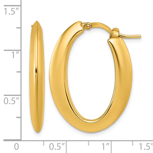 A pair of polished gold-colored oval hoop earrings with posts and backs, shown against a measurement scale indicating approximately one inch in height and half an inch in width.
