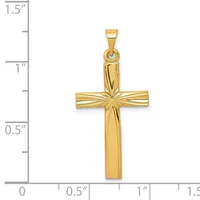 Gold cross pendant with a sunburst pattern in the center, shown next to a ruler indicating it measures approximately 1.25 inches tall and 0.75 inches wide.