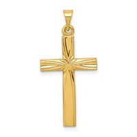 A gold cross pendant with a polished finish and textured center intersection, displayed against a white background.