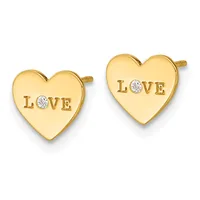 Pair of gold heart-shaped stud earrings engraved with the word "LOVE" and each featuring a small round diamond, shown from the front.