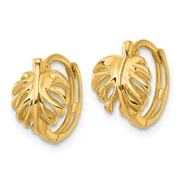 A pair of gold-colored hoop earrings with leaf-shaped decorative elements attached to the front of each hoop.