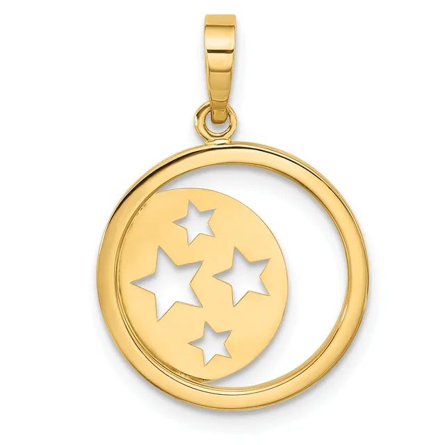 Gold pendant featuring a circular frame with a smaller oval disc inside, decorated with four white star cutouts arranged across the surface.