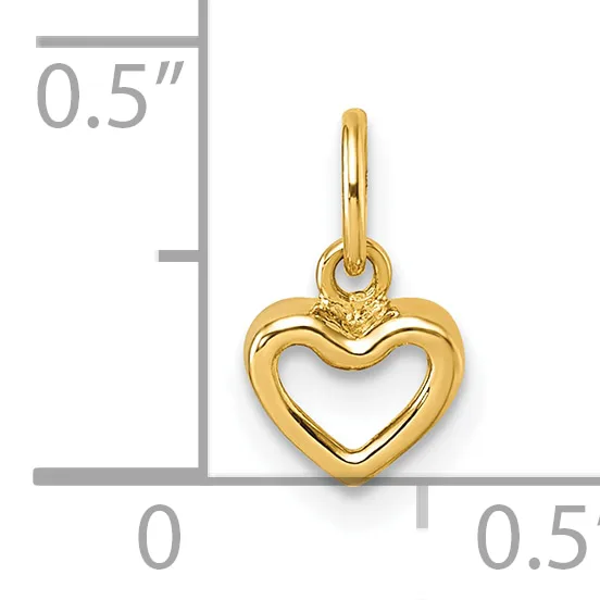 A small gold heart-shaped pendant with a hollow center and loop attachment, shown next to a ruler indicating its size as approximately 0.5 inches.