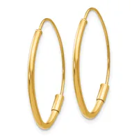 A pair of gold hoop earrings with a polished finish and hinged closures, displayed against a white background.