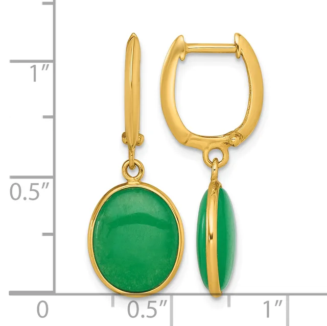 Gold-toned oval hoop earrings with dangling green cabochon stone pendants, displayed next to a measurement ruler.