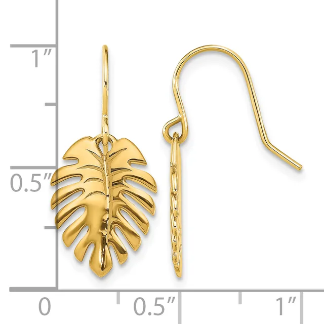 Gold-toned monstera leaf drop earrings with French wire hooks, displayed against a measurement scale showing approximately one inch in length.