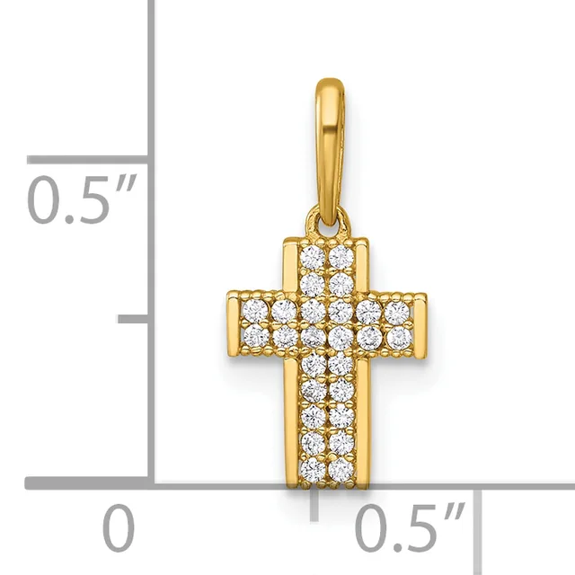 A gold cross pendant set with small round diamonds throughout, shown next to a measurement scale indicating it is approximately half an inch wide.