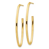 A pair of polished gold hoop earrings with elongated oval shapes and post closures displayed against a white background.
