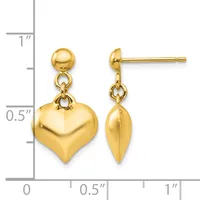 Gold-toned heart-shaped dangle earrings with ball studs, shown front and side views next to a measurement ruler indicating approximately one inch in length.