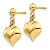 Pair of gold-toned drop earrings with ball studs connected by small chain links to polished puffy heart charms.